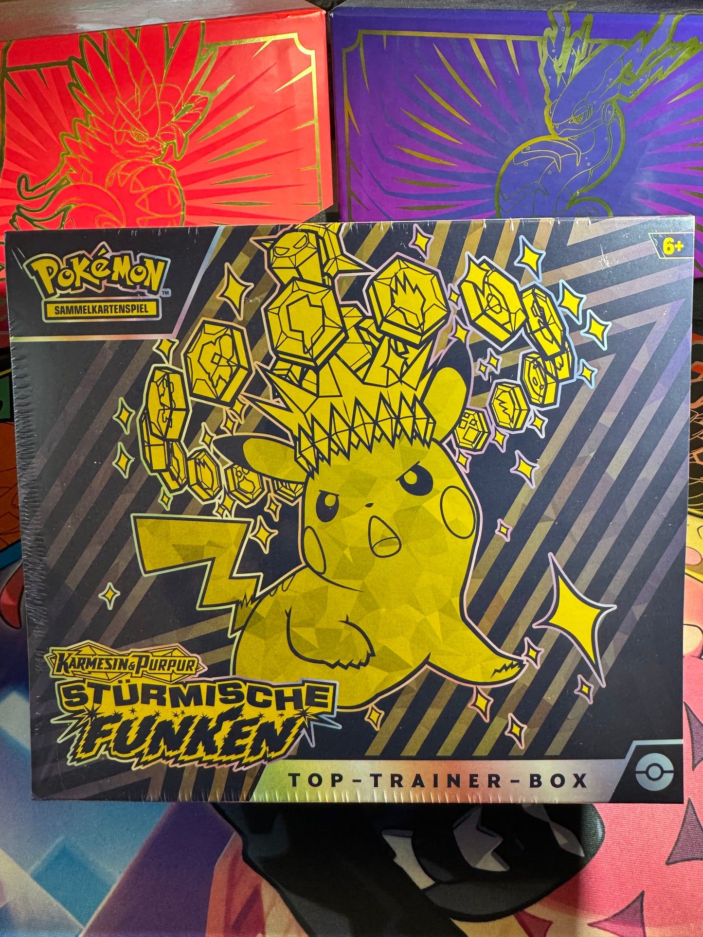 Karmesin & Purpur Stürmische Funken Elite Trainer-Box (DE)